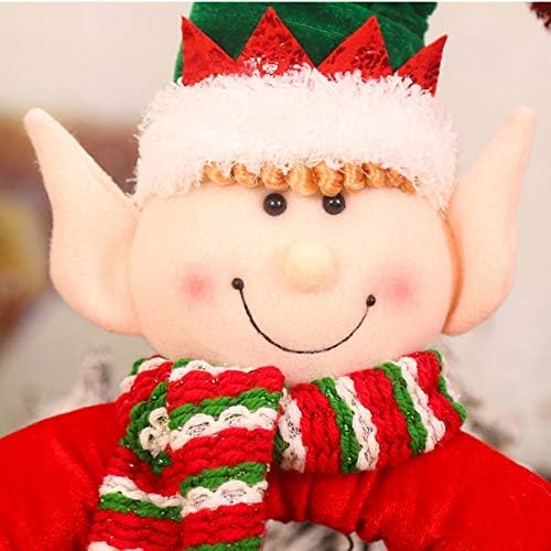 Змца Нов Дедо Мраз што го држи елката на дрвото што виси украс за орнаменти на Божиќни украси Фестивалски партии снабдува празници