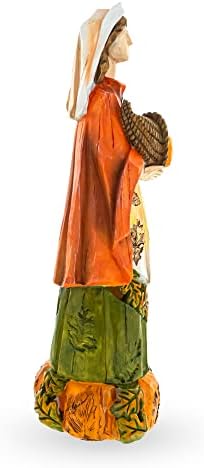Најдобра жена аџија жена која држи рог од многу корнукопија фигура на Денот на благодарноста
